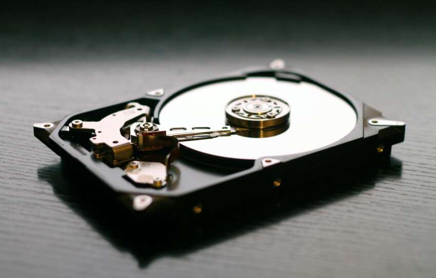 black internal hdd on black surface