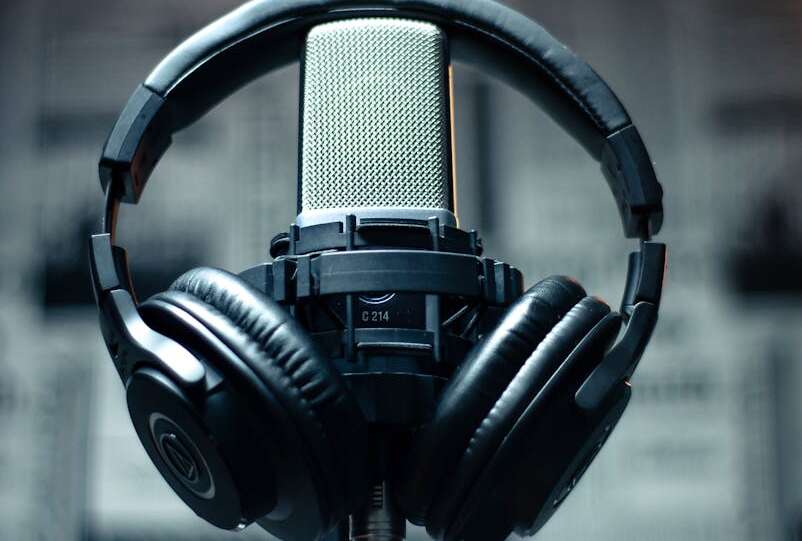 black headset on condenser microphone